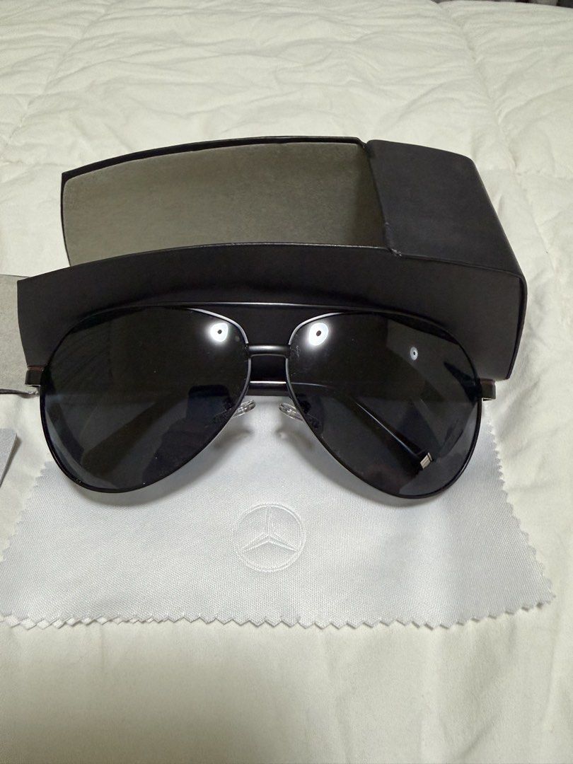 Mercedes-Benz Aviator Sunglasses with Case (Category: Sunglasses & Eyewear) located in Manila. Submitted by beanie6908 (Listing ID 1467015397, Image 2). Description: - Brand: Mercedes-Benz - Style: Classic aviator sunglasses in sleek black with metal frames - Lenses: Dark tinted, clean, and 100% scratch-free - Condition: Excellent / pristine - Inclusions: Original branded hardshell case, cleaning cloth, and authentication card - Rushed shipping a