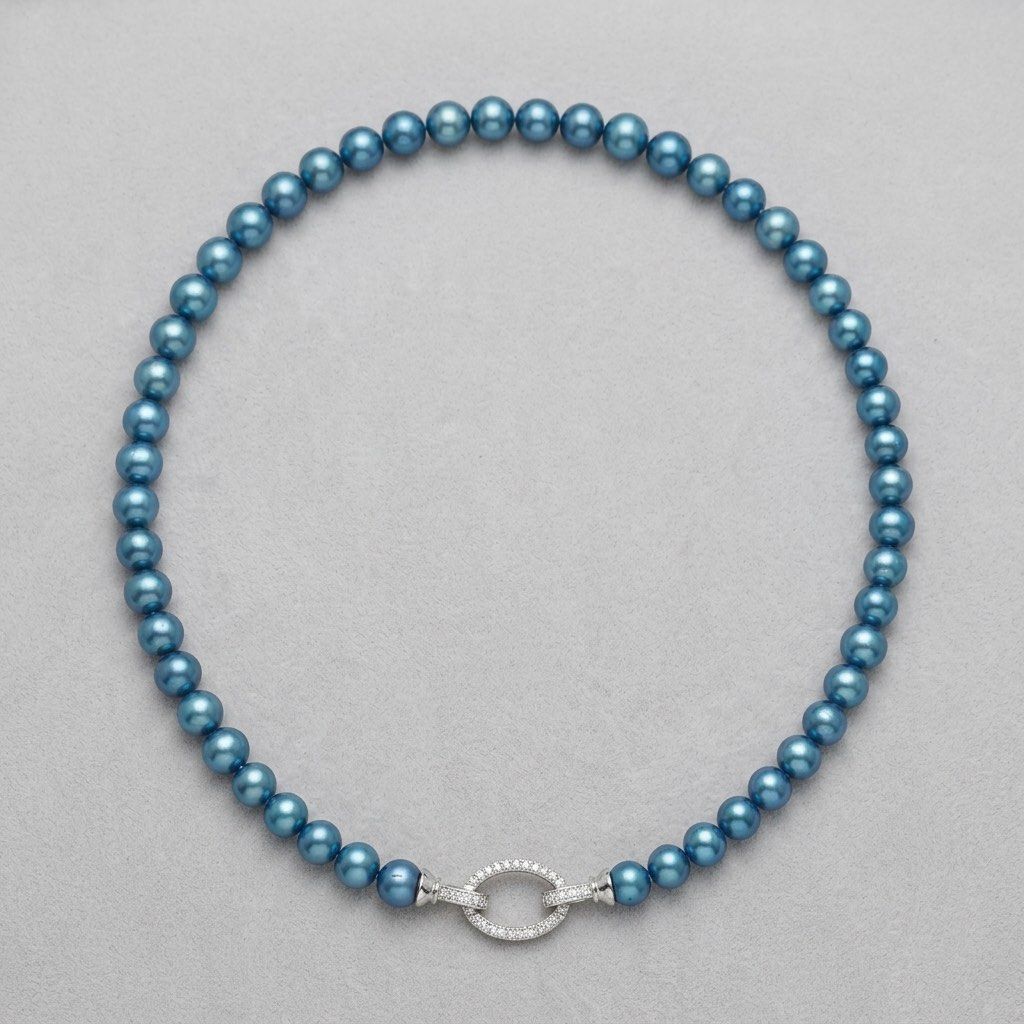 Metallic blue Pearl necklace (Category: Necklaces) located in Lipa City. Submitted by avenueusco_ph (Listing ID 1467010747, Image 1). Description: Color: Metallic blue or peacock blue. Undertone: Deep ocean blue with teal and silvery highlights. Shape: Mostly round to near-round, with slight variations. Luster: Strong, shiny, metallic-looking surface. Size: 6.8mm pearl size and 16inch long.