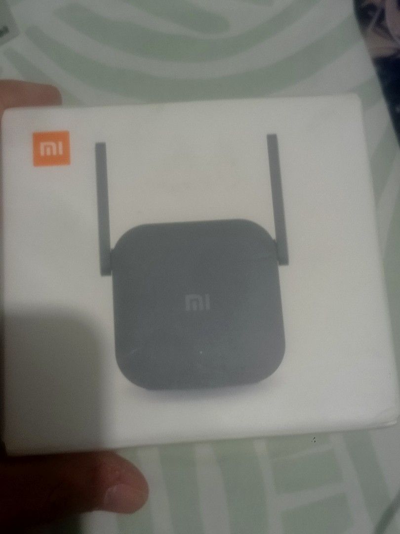 Mi WiFi Range Extender Pro | Model: R03 (Category: Networking) located in Manila. Submitted by gian_ocampo (Listing ID 1467050954, Image 1). Description: ✅ Condition - Slightly used, fully functional - Complete with original box, manual, and plug - No scratches, cracks, or damage - Clean, like-new appearance - Tested & working perfectly ✅ Details - Model: Mi WiFi Range Extender Pro (R03) - Speed: 300Mbps (2.4GHz) - Dual external antennas for stro