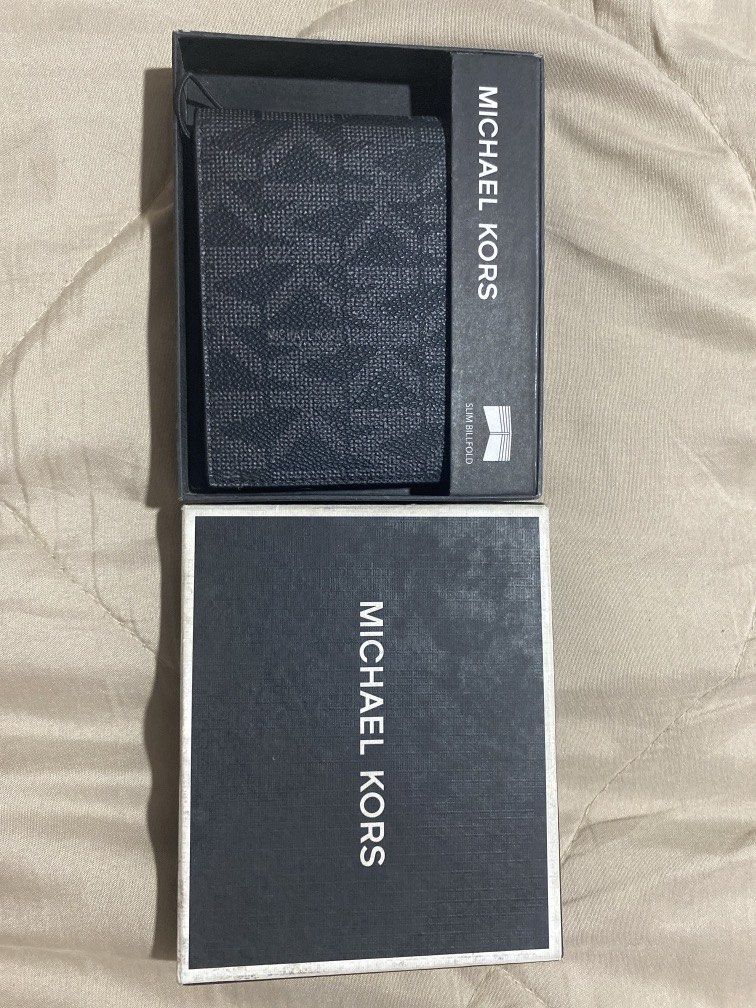 Michael Kors Slim Billford Wallet (Category: Wallets & Card Holders) located in Manila. Submitted by mxttmatt (Listing ID 1467101857, Image 1). Description: Brand new MK wallet, never used it RFS: For college!.
