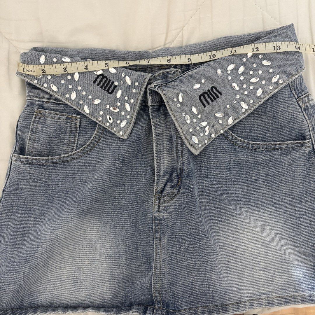 Mini Denim Skirt - Miu Miu design (Category: Skirts) located in Dasmarinas. Submitted by twiceasnewph (Listing ID 1467118943, Image 2). Description: Preloved size waist 28-28 inches length 13 inches Rfs: decluttering.