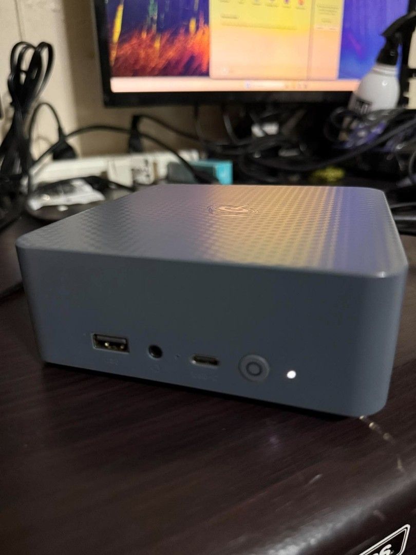 Mini PC AMD Radeon Graphics 475GB Storage (Category: Desktops) located in Manila. Submitted by sultankenb38643 (Listing ID 1467141631, Image 3). Description: Compact mini PC for daily tasks. Runs on Windows 11. Powered by AMD Radeon Graphics. Includes 475GB storage capacity. Front panel equipped with USB port, audio jack, and USB-C port. Power button with indicator light on front. Clean setup, takes up minimal desk space..