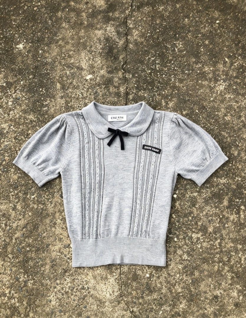 MIU MIU KNITTED TOPS (Category: Others Tops) located in Cabagan. Submitted by ukayflips (Listing ID 1467064600, Image 1). Description: DIMES W 14.7 L 17.8 GOOD CONDITION COMPLETE TAGS COLOR RATE 9/10 ISSUE ❌.