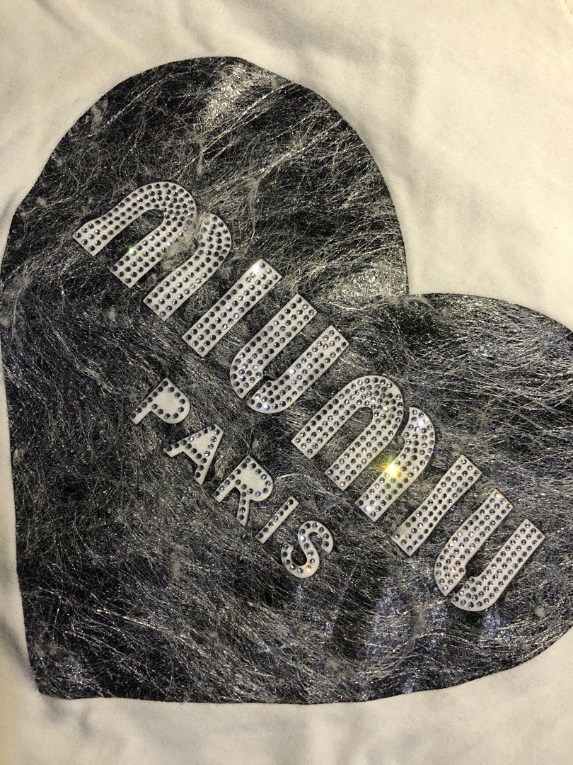 miu miu rhinestones luxury tee (Category: Activewear) located in Manila. Submitted by buksthrifthing (Listing ID 1466973201, Image 2). Description: 21 by 24 Small to med for womens No issue Excellent to asnew condi Fresh from bale.