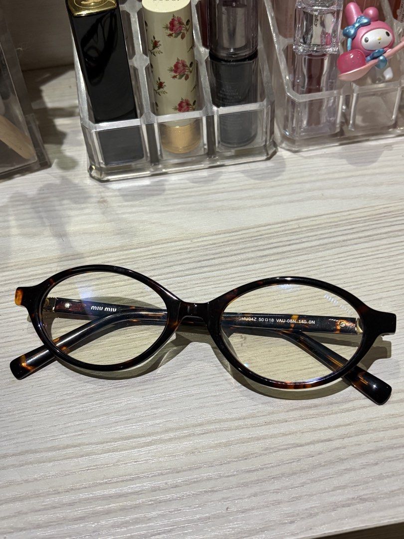 Miu Miu Tortoiseshell Oval Eyeglasses (Category: Sunglasses & Eyewear) located in Las Pinas. Submitted by sc.moo04 (Listing ID 1467162320, Image 1). Description: - no case.