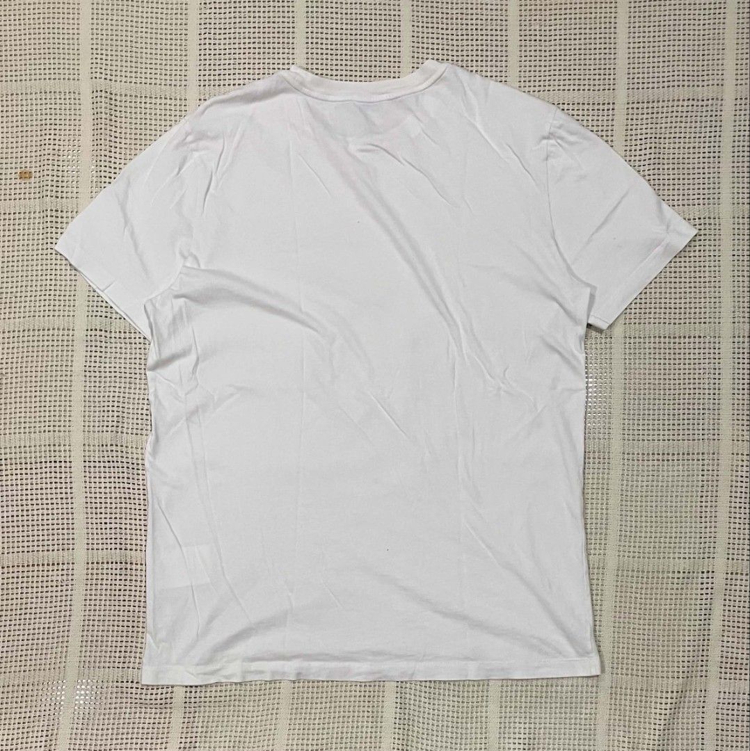 Moncler Enfant Logo Patch Tee (Category: Luxury Apparel) located in Bacolod City. Submitted by abkicks_apparel (Listing ID 1467129973, Image 2). Description: Moncler Enfant Logo Patch Tee Large on Tag W21.5 L28 Excellent Condition No Hidden Issues .