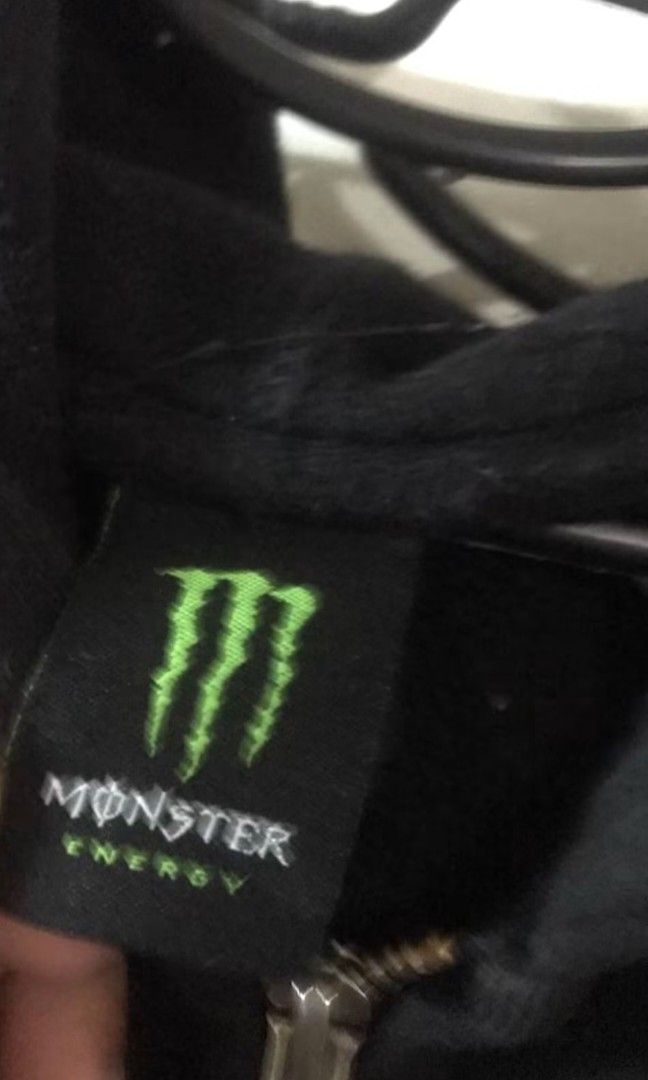 Monster Zip-up Hoodie Jacket (Orig) (Category: Coats, Jackets and Outerwear) located in Bacolod City. Submitted by decayed_outlet (Listing ID 1467163594, Image 3). Description: 100% Cotton Orig Monster Tag XL on Tag Color : Black Designs : Embroidered Condition : 10/10 issue : Stain, Scratch.