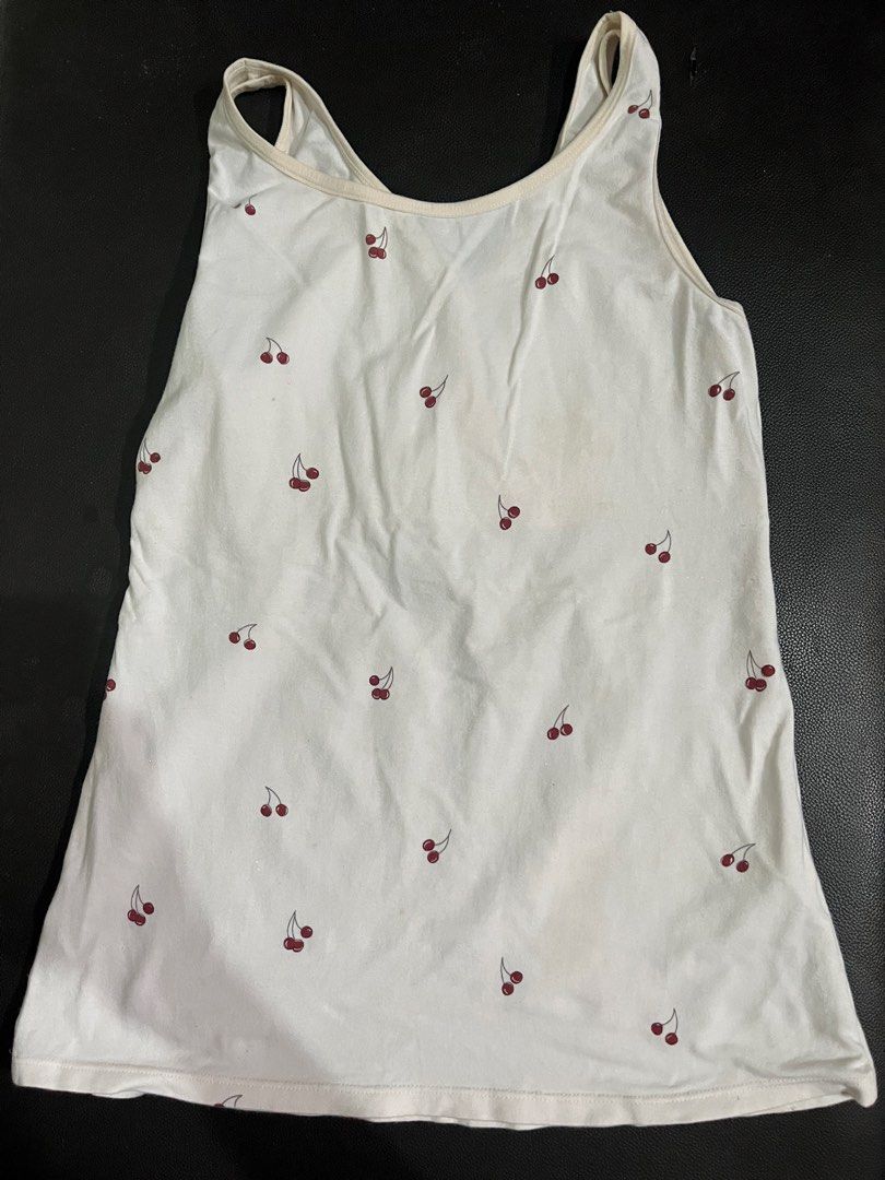 Moo Jane White Cherry Print Tank Top Size L (Category: Sleeveless) located in Manila. Submitted by rhiangastadora (Listing ID 1467039214, Image 2). Description: - Design: White tank top with all-over cherry print and flattering V-neck - Detail: Gathered fabric below the bust for a nice fit - Material: Soft and stretchy cotton blend - Size: L (165/96C) - Condition: Worn a few times, well-maintained with plenty of life left.