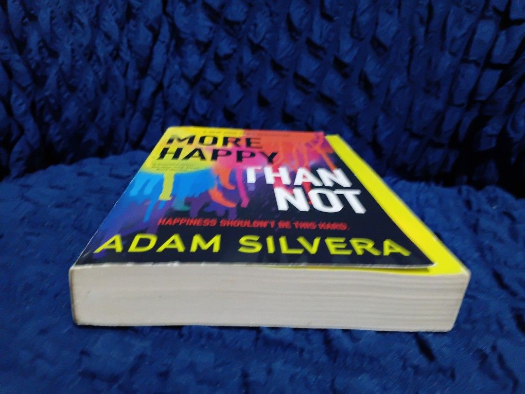 More Happy Than Not by Adam Silvera (Category: Storybooks) located in Baguio. Submitted by ravenousreader_1922 (Listing ID 1466984557, Image 2). Description: - Title: More Happy Than Not by Adam Silvera - Publisher: Soho Teen - Genre: Young Adult Contemporary Fiction / Sci-Fi - Condition: Clean pages with minor shelf wear on edges and corners - Highlights: New York Times bestseller, perfect for fans of emotional YA drama - For shipping through J&
