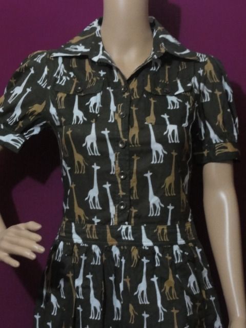 MOSCHINO BROWN GIRAFFE DRESS (Category: Dresses) located in Marikina City. Submitted by minimalistmanila (Listing ID 1464862340, Image 2). Description: Moschino giraffe printed brown dress. Small size. 16 inches chest, 39.5 inches length. No more label. Old stock and unused. Order now! .