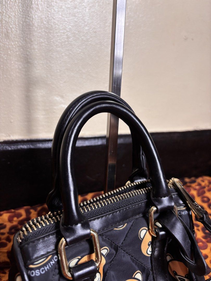 Moschino Teddy Bear Small Handbag (Category: Purses & Pouches) located in Manila. Submitted by earlylifecrisis3 (Listing ID 1467095606, Image 2). Description: Condition 9/10 Measure it by inch Width: 6 Length: 5.3 Depth: 3.5 Handle:4 •Refund / Returns not allowed allowed •Please do check the dimensions size on labels sometimes are not accurate on the sizing •Ask me before purchasing.