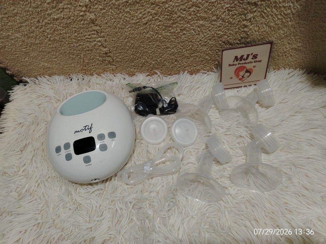 Motif Luna Double Electric Breast Pump (Category: Breastfeeding & Bottle Feeding) located in Pulilan. Submitted by mjbabyproductsshop (Listing ID 1467042091, Image 1). Description: - Authentic Motif Luna double electric breast pump set - Includes main motor unit, power adapter, clear tubing, four flanges, valves, and instruction manual - Original box included - All parts are clean, sanitized, and ready for immediate use - Trusted seller, ships im