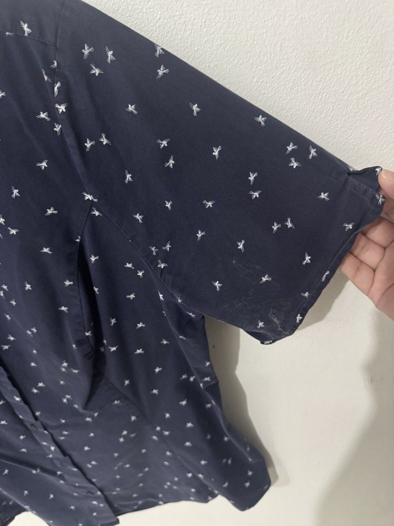 Marks & Spencer Collection Polo (Category: Blouses) located in Pasig City. Submitted by pmlmri (Listing ID 1467155757, Image 3). Description: - Brand: Marks & Spencer Collection - Style: Short sleeve button-down blouse - Color/Pattern: Navy blue with an all-over white bird/insect print - Condition: Excellent pre-loved condition Mode of Shipping: J&T or Lalamove Mode of Payment: Gotyme/BPI/Gcash.