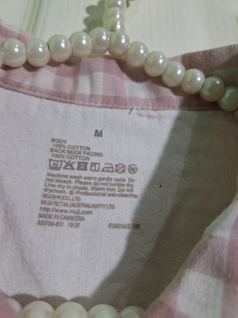 Muji cotton hemp jacket medium uniqlo (Category: Shirts) located in San Pablo. Submitted by allyourbrandedneeds (Listing ID 1467083638, Image 3). Description: - Brand: Muji - Size: Medium (Regular fit) - Color: Pink and white checkered - Material: 100% soft and breathable cotton - Design: Classic collar, front button closure, and two large patch pockets at the hem - Sleeves: Long sleeves - Condition: Excellent / Pre-loved (ready to wear) - Style 