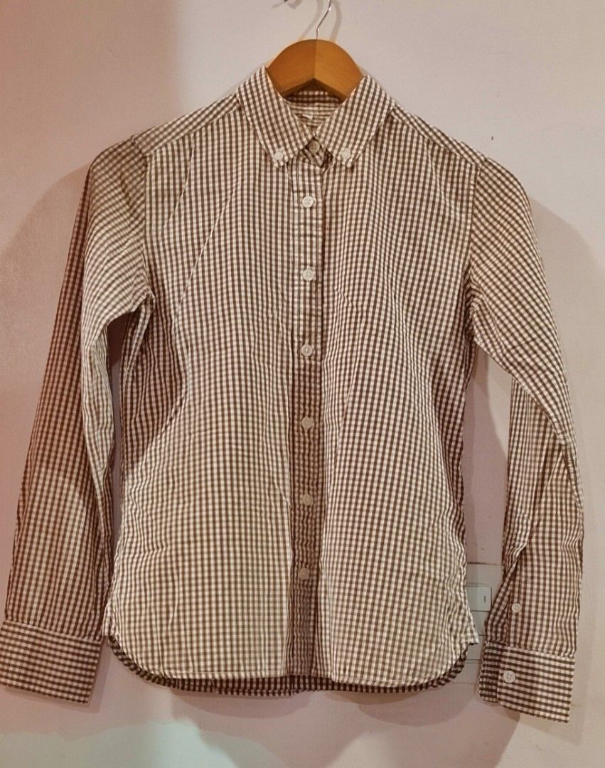 MUJI Washed Gingham Check Button-Down Shirt (Category: Longsleeves) located in Cabanatuan. Submitted by miss.maia (Listing ID 1467082204, Image 2). Description: MUJI Washed Gingham Check Button-Down Shirt. This classic long-sleeve top features MUJI's signature minimalist design, a structured button-down collar, organic pre-washed cotton fabric, and a curved casual hemline..