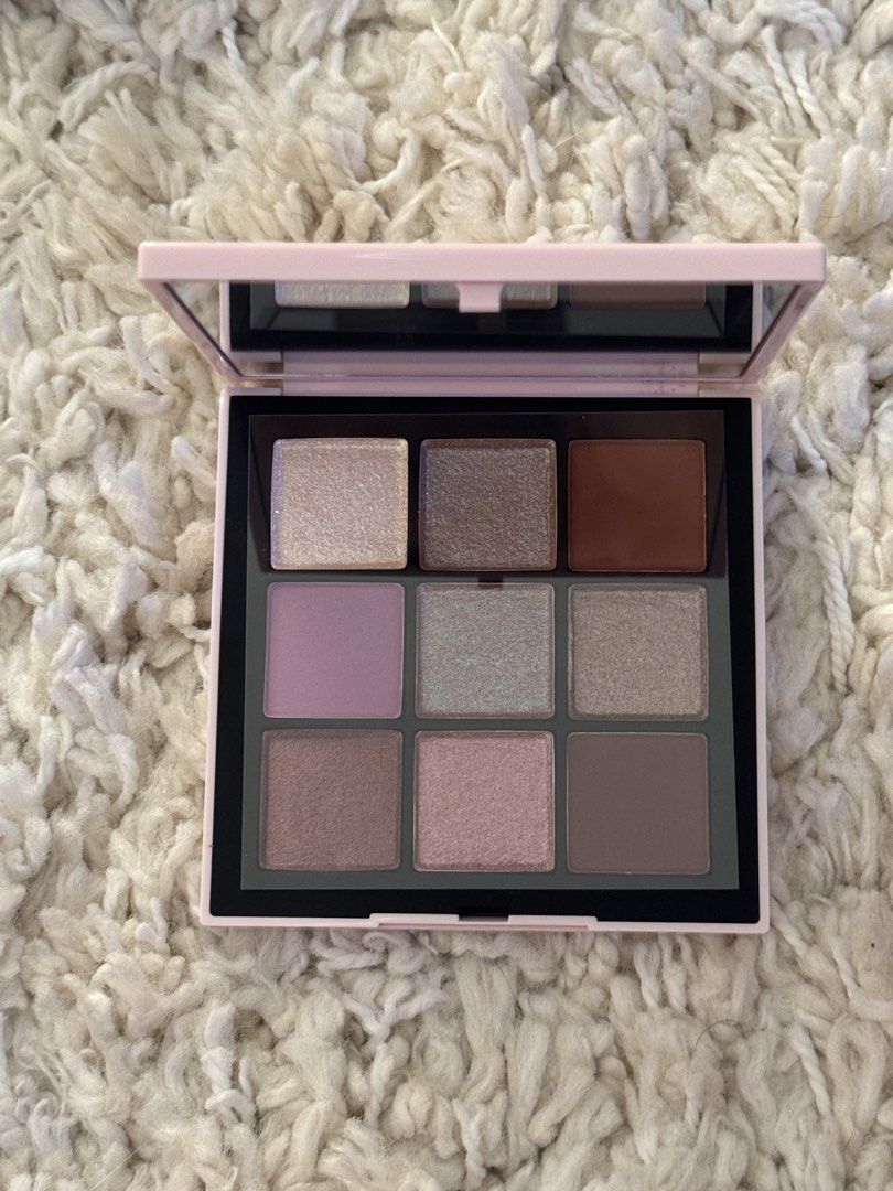 NARS Afterglow Tempting Eyeshadow Palette (Category: Makeup) located in San Nicolas. Submitted by ihascat (Listing ID 1467020492, Image 2). Description: - Brand: NARS - Product: Afterglow Tempting Eyeshadow Palette - Condition: Brand new, never opened or swatched, pristine retail condition - Shades: 9 versatile shades including pinks, taupes, and warm browns - Finishes: A mix of gorgeous shimmer and matte finishes - Features: Built-in compact mir