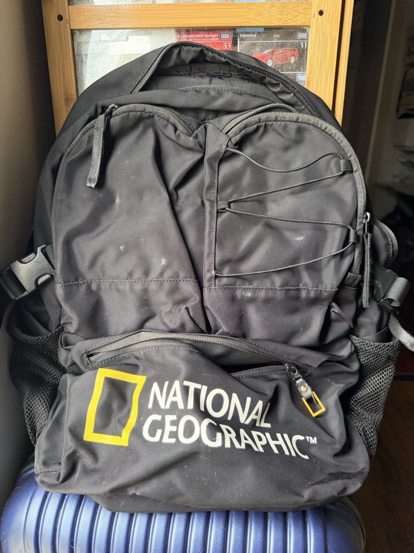 National Geographic Utility Backpack Black (Category: Backpacks) located in Dasmarinas. Submitted by mspigrabbit (Listing ID 1467034472, Image 1). Description: - Brand: National Geographic - Color: Classic Black - Material: Durable, high-quality fabric construction - Storage: Spacious main compartment with an internal padded laptop sleeve and branded label patch - Pockets: Multiple exterior zip pockets and convenient mesh side pockets - Extras: F