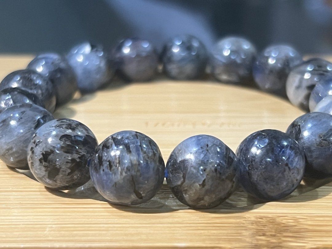 Natural Devil Kyanite Gemstone beaded bracelet 17cm (Category: Bracelets) located in Quezon City. Submitted by ohmystones_088 (Listing ID 1467164814, Image 1). Description: - Dark blue and black patterned crystal beads - Measures 17cm around on a stretch cord - Smooth polished surface with natural inclusions and chatoyant flashes - Nice, substantial weight - Perfect to wear alone or stack with other pieces 100% Authentic / Natural Gemstones Bead 