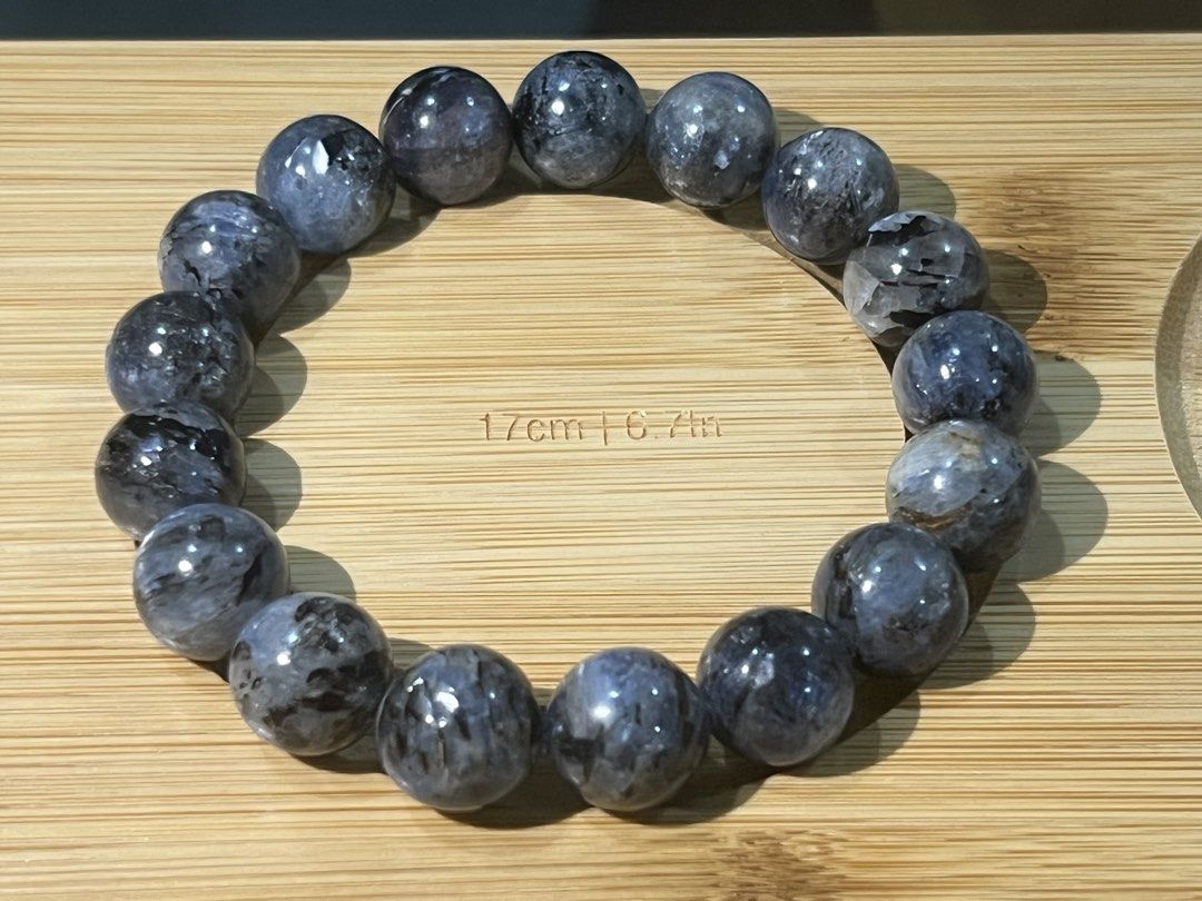 Natural Devil Kyanite Gemstone beaded bracelet 17cm (Category: Bracelets) located in Quezon City. Submitted by ohmystones_088 (Listing ID 1467164814, Image 2). Description: - Dark blue and black patterned crystal beads - Measures 17cm around on a stretch cord - Smooth polished surface with natural inclusions and chatoyant flashes - Nice, substantial weight - Perfect to wear alone or stack with other pieces 100% Authentic / Natural Gemstones Bead 