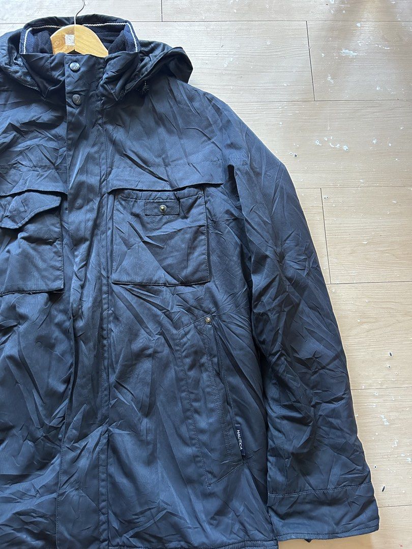 Nautica Zip and Snap Jacket with Hood (Category: Coats, Jackets and Outerwear) located in Calbayog City. Submitted by thrift.bucks101 (Listing ID 1467002785, Image 2). Description: - Authentic Nautica - Color may vary due to lighting - PM for complete washtags -Zip-up front with storm flap - Multiple front utility pockets with snap buttons - Attached hood with high collar for extra warmth - Adjustable drawstring at the hem - Details: Branding tag