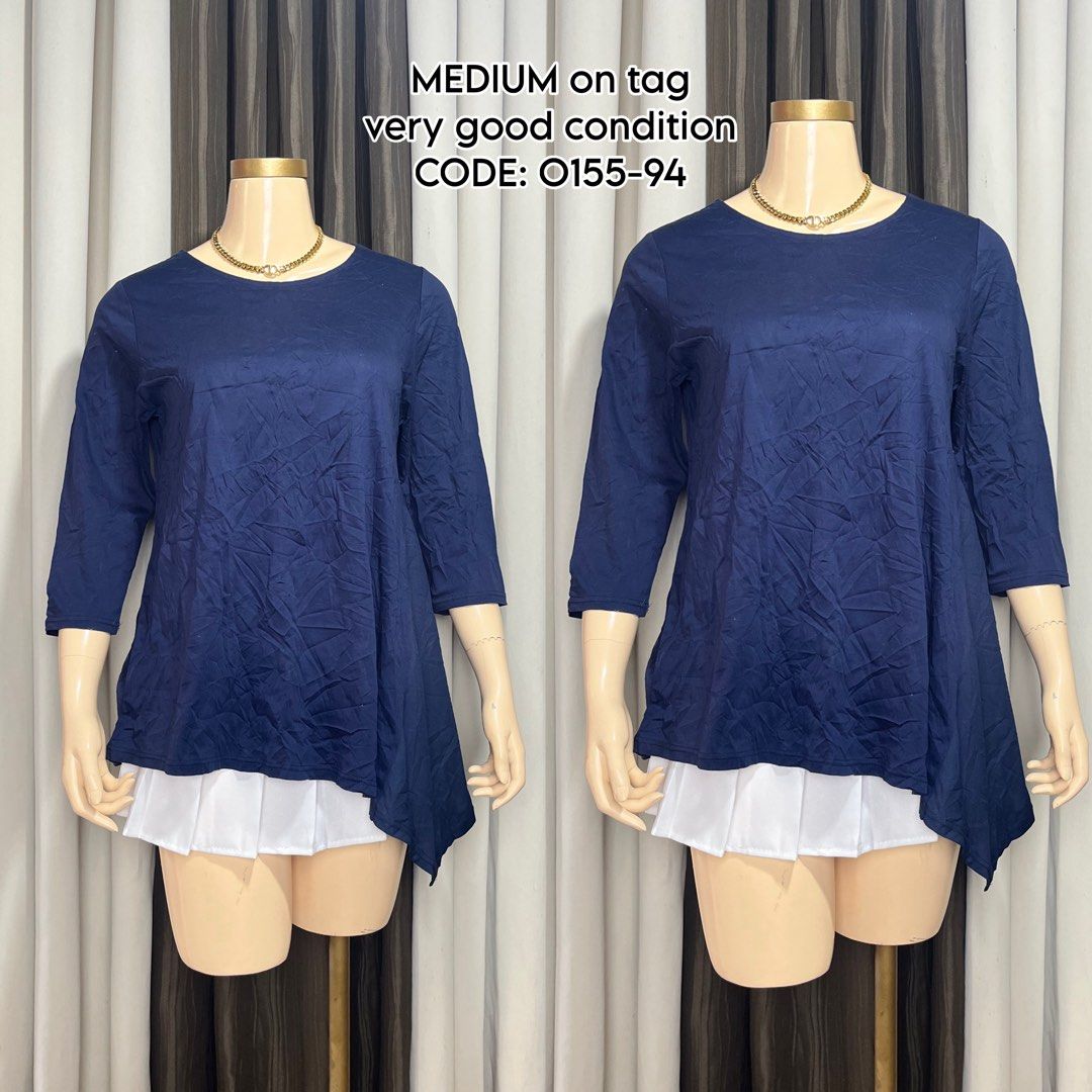 Navy Blue Asymmetric Top (Category: Blouses) located in Naga. Submitted by rmapprl (Listing ID 1467125153, Image 1). Description: - Color: Navy blue - Size: Medium (Code: O155-94) - Styling: Perfect to pair with jeans or leggings for casual wear.
