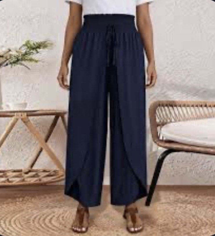 Navy Blue Boho Pants Beach Pants Side Slit-Open Summer Oants (Category: Other Bottoms) located in Quezon City. Submitted by madame_royale (Listing ID 1467156856, Image 1). Description: This style is unique and can fit most sizes. Take note that the wide garter waist can really stretch and accommodate most. The overlad design of the pants allow more room for comfort and movement. Measurement: in inches Waist Range > 12.5-25” > 25-50” Hips > up to 