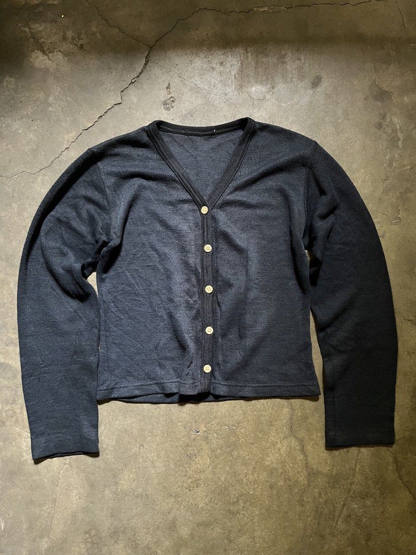 Navy blue V-neck knit cardigan (Category: Longsleeves) located in Manila. Submitted by ljpgdn (Listing ID 1467060424, Image 1). Description: Dm me for more deets :) • This product is a bundle of two.