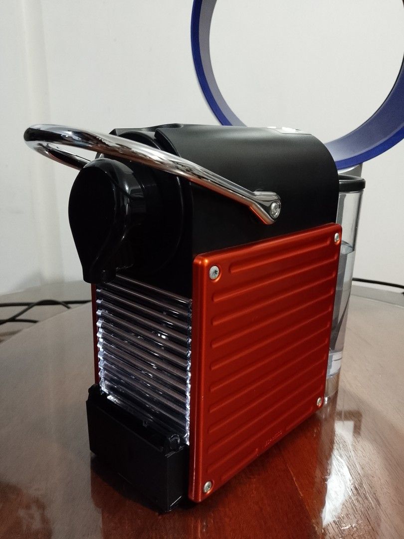 Nespresso Pixie Espresso Machine Red and Black (Category: Coffee Machines & Makers) located in Manila. Submitted by anvicnicajeff (Listing ID 1467140084, Image 1). Description: Almost New 17k srp Nespresso Pixie espresso maker in red and black. Compact footprint, quick heat-up system. Operates with Nespresso original capsules. Clean condition, works great. Includes water tank Automatic power off after 9 mins Empty water tank detection 3 KG 25 sec
