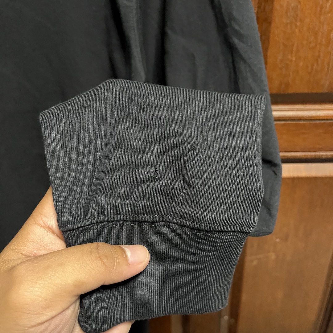 Nike ACG Dri-FIT Long Sleeve Tee Black Size S (Category: Activewear) located in Manila. Submitted by thriftyyyyy. (Listing ID 1467121921, Image 3). Description: - Brand: Nike ACG - Color: Black - Size: Small - Fit: Loose fit with Dri-FIT technology - Material: Cotton & polyester blend - Design: Embroidered ACG triangle logo on chest - Condition: Good overall, with a few small holes on the cuff (refer to close-up photo).