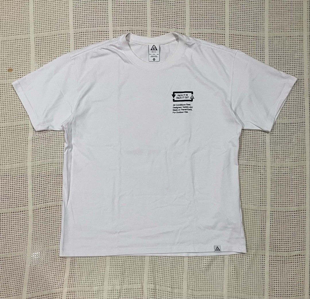Nike ACG Pickinout Graphic Tee (Category: Tshirts & Polo Shirts ) located in Bacolod City. Submitted by abkicks_apparel (Listing ID 1467133335, Image 1). Description: Nike ACG Pickinout Graphic Tee XL on Tag W23 L29 Authentic Original As New Condition No Hidden Issues .