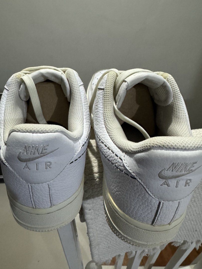 Nike Air Force 1 White Sneakers (Category: Sneakers) located in Cavite. Submitted by marcuz1316 (Listing ID 1467111937, Image 2). Description: - Brand/Model: Nike Air Force 1 Low - Colorway: White leather with contrast stitching and cream laces - Features: Aged-look soles and AF1 branded lace dubraes - Comfort: Standard padding around the collar - Condition: Normal signs of wear on uppers and midsoles from previous use.