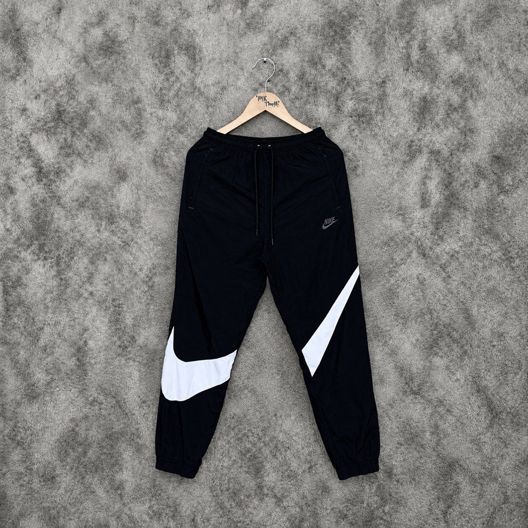 Nike Big Swoosh Woven Pants 🥵 (Category: Activewear) located in Consolacion. Submitted by kentripthrift (Listing ID 1467093614, Image 1). Description: Nike Big Swoosh Woven Pants 🥵 My Fav / Crispy Condition / Hard to find Design & Latest Tag 😍 Good As New Condition Color rate: 10/10 Color may vary due to lighting Size: Small on tag Dimes: 28-32W by 38L.