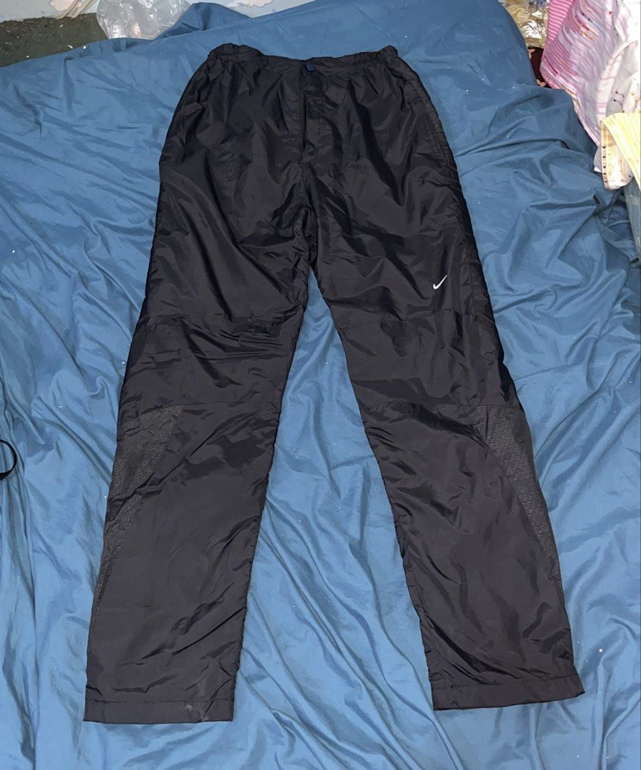 Nike Black Nylon Track Pants (Category: Joggers) located in Manila. Submitted by markergeyt (Listing ID 1467124197, Image 1). Description: Nike Nylon Trackpants Waistline - 24 Inches Length - 38 Inches Leg Hole - 7 Inches Slight issue - stain MOP - Gcash Location - Manila Courier - LBC .