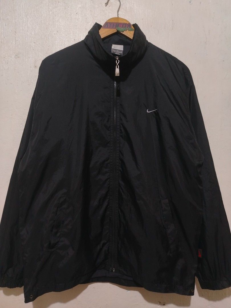 Nike Black Windbreaker Jacket packable hood (Category: Coats, Jackets and Outerwear) located in Rizal. Submitted by gmpastoffi75031 (Listing ID 1467018901, Image 1). Description: - Brand: Nike - dimes 23.8x29.5 - Style: Windbreaker jacket - Color: Black - Size: XL - Origin: Made in Indonesia - Material: Lightweight Dri-FIT fabric, perfect for layering - Details: Full zip front with metallic Nike logo pull, embroidered white swoosh on chest, and s