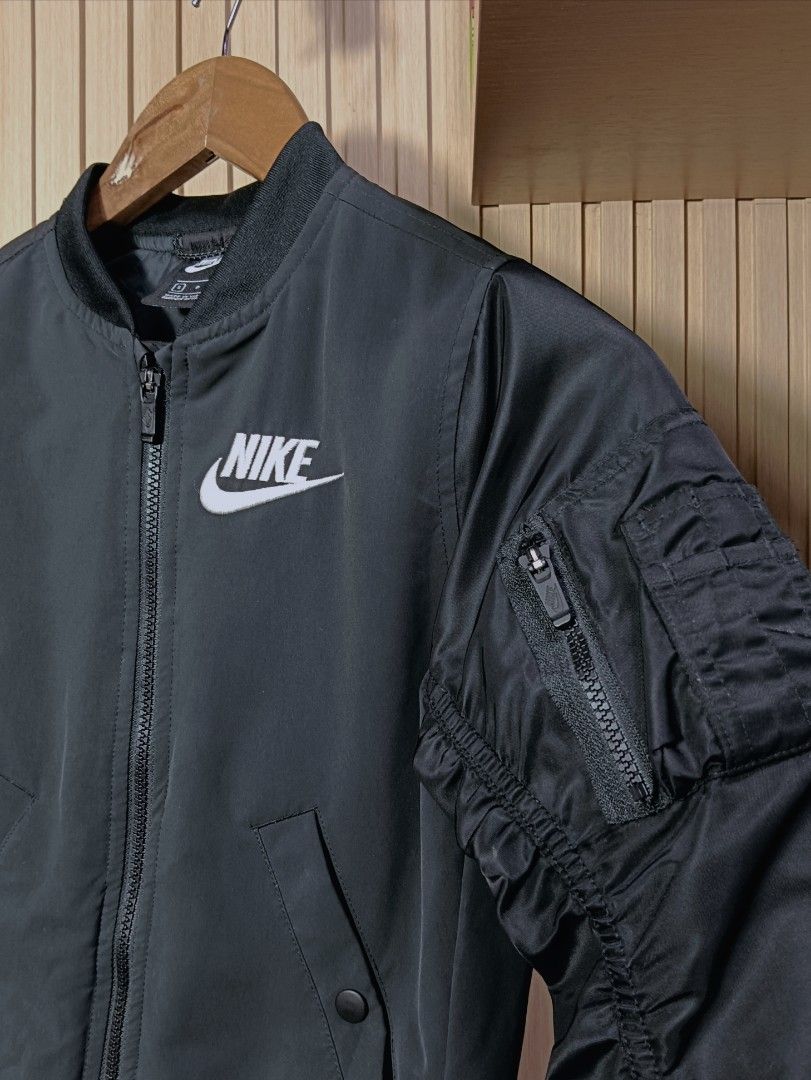 Nike Bomber Jacket (Category: Babies & Kids Fashion) located in Manila. Submitted by kidsthrifthustle (Listing ID 1467156570, Image 2). Description: NIKE BOMBER JACKET 8-10 YRS OLD LIKENEW.