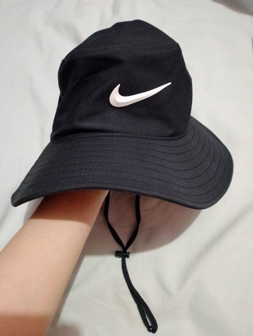 Nike Dri-FIT Black Bucket Hat (Category: Caps & Hats) located in Manila. Submitted by nievesolanna (Listing ID 1467009018, Image 1). Description: adjustable and removable chin strap. like new. no issues. used once only. 1,000 PESOS LOC: SAMPALOC, MANILA.