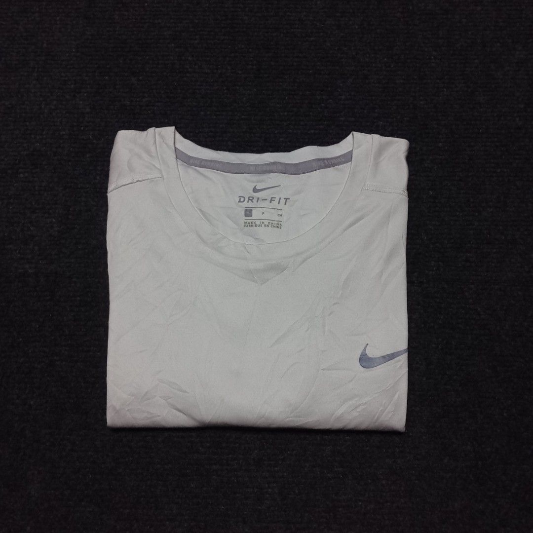 NIKE DRIFIT SHIRT (Category: Tshirts & Polo Shirts ) located in Irosin. Submitted by jamilflor (Listing ID 1467136850, Image 2). Description: NIKE DRIFIT SHIRT as new No major issue Size Small on tag Excellent condition Reflectorize swoosh 20W x 26L measurements -.
