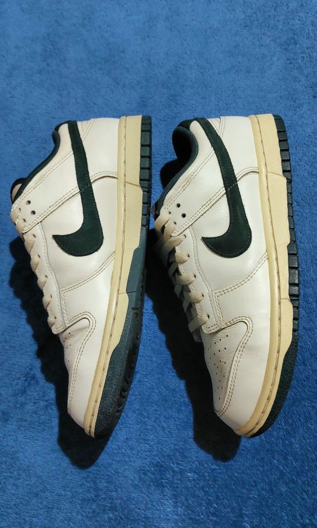 Nike Dunk Low - Athletic Department / Deep Jungle (Category: Casual Shoes) located in Makati City. Submitted by maginoo15 (Listing ID 1467159398, Image 3). Description: Size 8.5 / 42 US Men Original Bought at Nike App & Picked up at Nike The Fort, BGC Aged Look: Styled with a pre-yellowed midsole and vintage-style laces for an old-school look. • Payment: GoTyme / UnionBank / Cash • Swap ❌ COD ❌ Pick-up / Meet-up locations: • Choice Market Ortigas