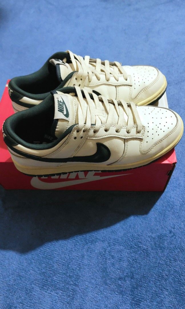 Nike Dunk Low - Athletic Department / Deep Jungle (Category: Casual Shoes) located in Makati City. Submitted by maginoo15 (Listing ID 1467159398, Image 2). Description: Size 8.5 / 42 US Men Original Bought at Nike App & Picked up at Nike The Fort, BGC Aged Look: Styled with a pre-yellowed midsole and vintage-style laces for an old-school look. • Payment: GoTyme / UnionBank / Cash • Swap ❌ COD ❌ Pick-up / Meet-up locations: • Choice Market Ortigas