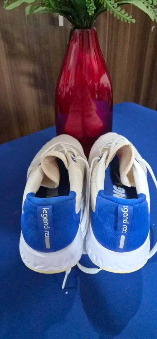 Nike Legend React Running Shoes White Blue Size US 10.5 (Category: Sneakers) located in Manila. Submitted by pixiedachi (Listing ID 1467028433, Image 2). Description: - Brand/Model: Nike Legend React (AA1625-101) - Color: White and Blue - Size: US 10.5 / UK 9.5 / EUR 44 - Upper: Breathable mesh with secure lace-up closure - Sole: Cushioned midsole for maximum comfort - Ideal for: Daily runs, gym workouts, and casual wear.