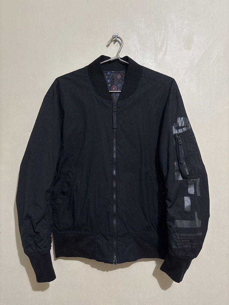 Nike NSW AF1 Reversible Bomber Jacket (Category: Coats, Jackets and Outerwear) located in Muntinlupa City. Submitted by owrayttttt (Listing ID 1467067493, Image 1). Description: - Nike NSW AF1 Reversible Bomber Jacket - Size Medium on tag - Dimes 23.5 x 27 - With tags - No issue - Free shipping via j&t.