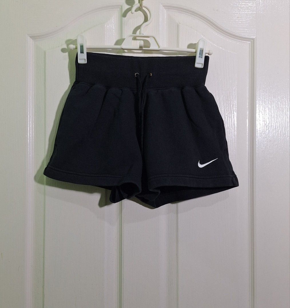 Nike phoenix fleece short xs - small (Category: Shorts) located in San Pablo. Submitted by allyourbrandedneeds (Listing ID 1467040437, Image 3). Description: - Authentic black Nike fleece shorts - Thick ribbed waistband with adjustable drawstring for a secure fit - Convenient deep side pockets on both sides - Classic white embroidered Nike swoosh on the left leg - Standard fit, ideal for casual wear, workouts, or lounging at home.