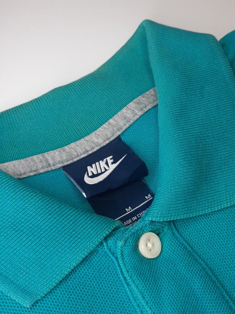 Nike poloshirt (Category: Tshirts & Polo Shirts ) located in Bauang. Submitted by 2ndskinz_by.irie (Listing ID 1467076935, Image 3). Description: nike poloshirt in cyan/turquoise colorway size: medium measurements- length: 27" width: 17.5" good condition no issues/complete tags embroid swoosh chest logo 550 +sf shipping via jnt express la union 📍 DM 📩.