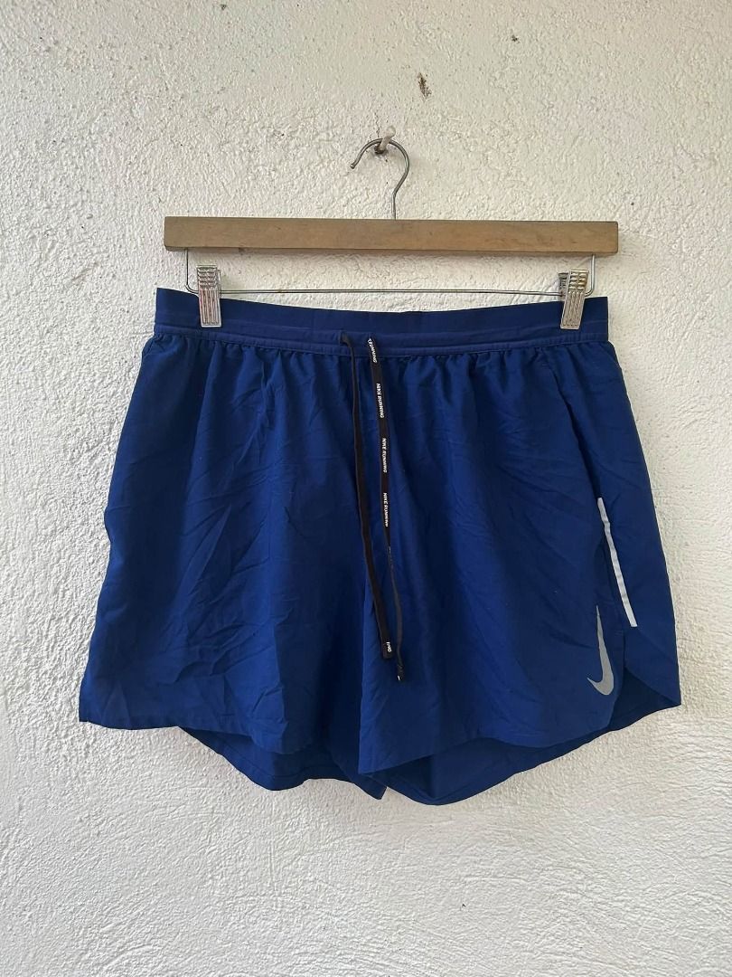 NIKE RUNNING SHORT (Category: Shorts) located in Caloocan City. Submitted by j3ngsanity (Listing ID 1467081650, Image 1). Description: ISSUE : MIN LINTS / TINANGGAL YUNG INNER LAYER DIMES : 31x25x14.