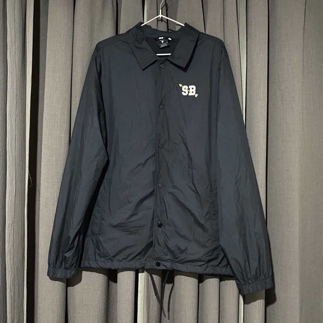 Nike SB Black Coaches Jacket Size L (Category: Coats, Jackets and Outerwear) located in Manila. Submitted by seramisu (Listing ID 1467073825, Image 1). Description: - Authentic Nike SB coach jacket in black, size Large - Snap button closure with classic collar neckline - Adjustable drawstring hem for a custom fit - Distinct white and gold 'SB' graphic printed on the left chest - Official Nike SB inner tag and branding - Versatile outer layer, gre