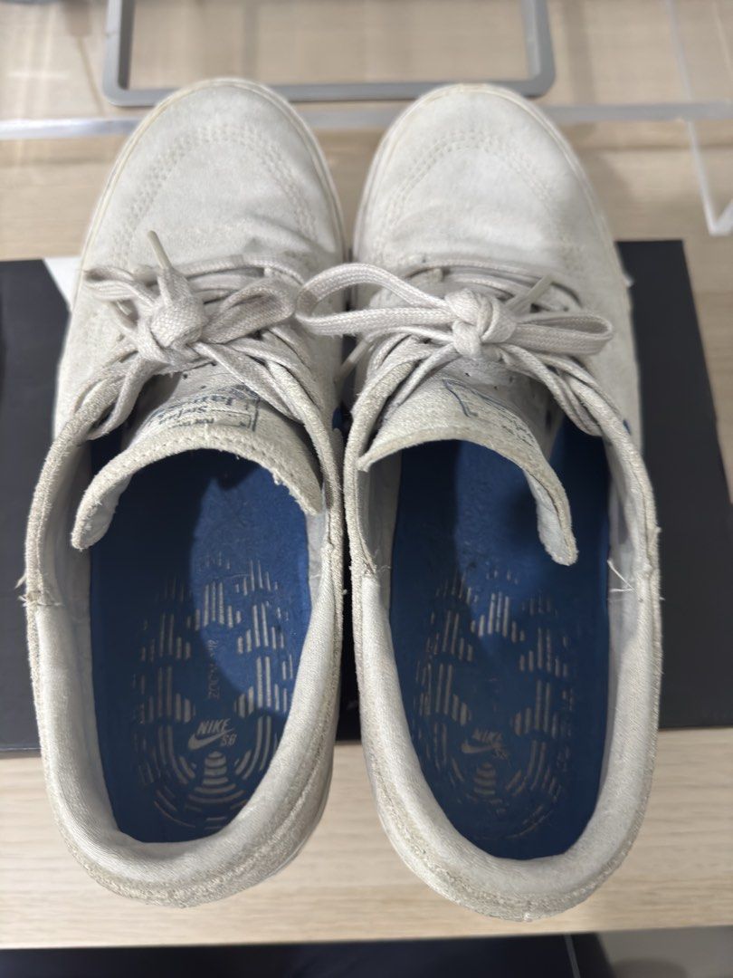 Nike SB Stefan Janoski Grey Blue (Category: Sneakers) located in Caloocan City. Submitted by leandroroman (Listing ID 1467130231, Image 3). Description: - Brand: Nike SB Stefan Janoski - Color: Light grey suede with blue embroidered swoosh - Sole: Classic white rubber midsole with intact blue branded insoles - Condition: Pre-owned with minor scuffs and dirt marks from general wear; still plenty of life left for skating or daily casual use - Inclu