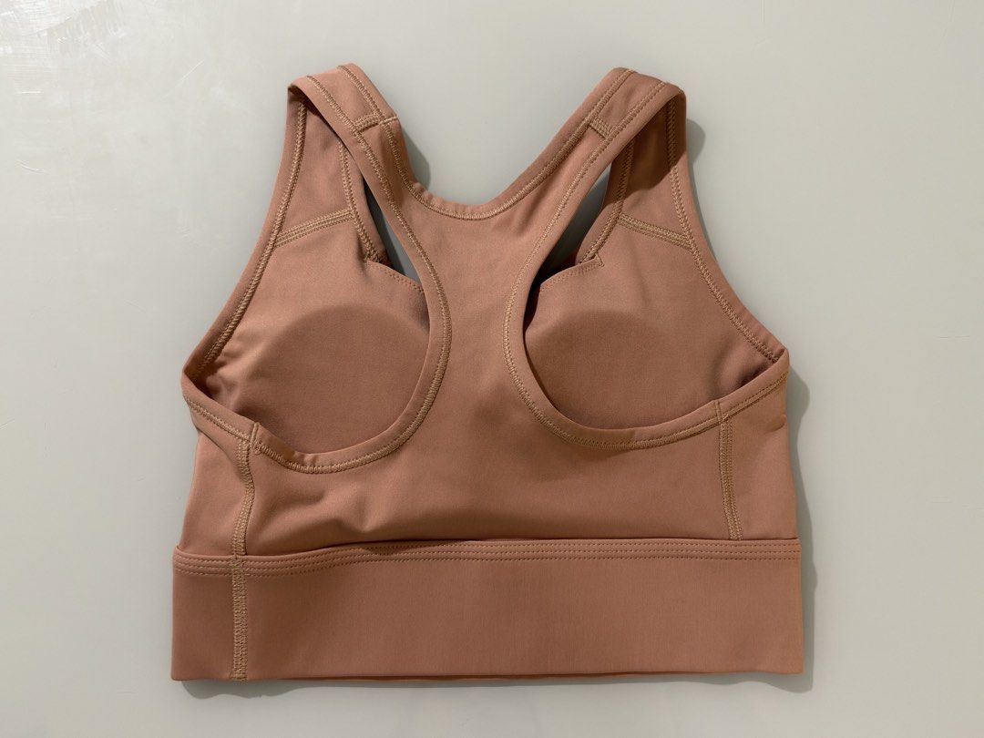 Nike Sports Bra Pink (Category: Activewear) located in Quezon City. Submitted by ccloset.cleanup (Listing ID 1467146808, Image 2). Description: 12 inches width 12.5 inches length 100% AUTHENTIC 💛 ❌ I WILL NOT REPLY TO LOW BALLERS 📣NO WHEN WORN PHOTOS, since flat-lay measurements are provided 🛵Mode of Delivery: Only Lalamove, Grab, or Angkas *Booking & Shipping fees, booked and shouldered by the Buyer* 💰Mode of Payment: GCash or Bank Transfer 
