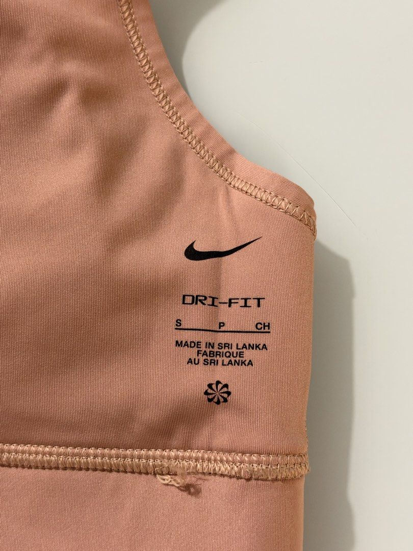 Nike Sports Bra Pink (Category: Activewear) located in Quezon City. Submitted by ccloset.cleanup (Listing ID 1467146808, Image 3). Description: 12 inches width 12.5 inches length 100% AUTHENTIC 💛 ❌ I WILL NOT REPLY TO LOW BALLERS 📣NO WHEN WORN PHOTOS, since flat-lay measurements are provided 🛵Mode of Delivery: Only Lalamove, Grab, or Angkas *Booking & Shipping fees, booked and shouldered by the Buyer* 💰Mode of Payment: GCash or Bank Transfer 