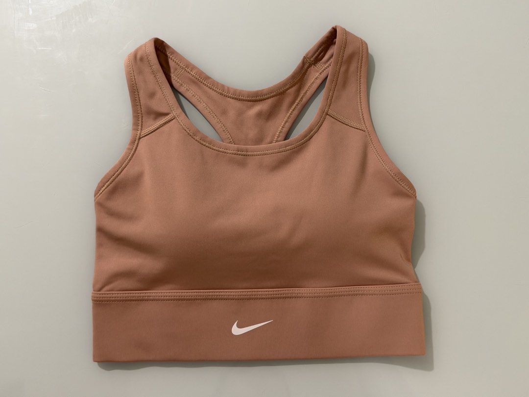 Nike Sports Bra Pink (Category: Activewear) located in Quezon City. Submitted by ccloset.cleanup (Listing ID 1467146808, Image 1). Description: 12 inches width 12.5 inches length 100% AUTHENTIC 💛 ❌ I WILL NOT REPLY TO LOW BALLERS 📣NO WHEN WORN PHOTOS, since flat-lay measurements are provided 🛵Mode of Delivery: Only Lalamove, Grab, or Angkas *Booking & Shipping fees, booked and shouldered by the Buyer* 💰Mode of Payment: GCash or Bank Transfer 