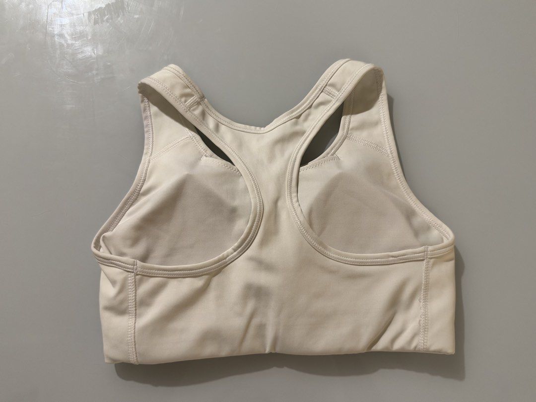Nike Sports Bra White (Category: Activewear) located in Quezon City. Submitted by ccloset.cleanup (Listing ID 1467147039, Image 2). Description: 100% AUTHENTIC 💛 ❌ I WILL NOT REPLY TO LOW BALLERS 📣NO WHEN WORN PHOTOS, since flat-lay measurements are provided 🛵Mode of Delivery: Only Lalamove, Grab, or Angkas *Booking & Shipping fees, booked and shouldered by the Buyer* 💰Mode of Payment: GCash or Bank Transfer (BDO or BPI) *Payment Before Shipp